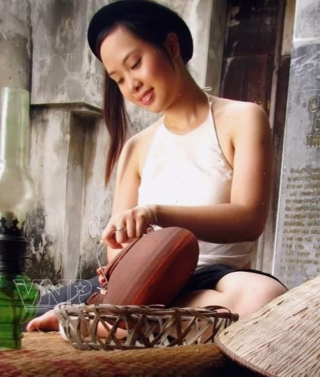 Cô gái mặc yếm đào nghệ thuật