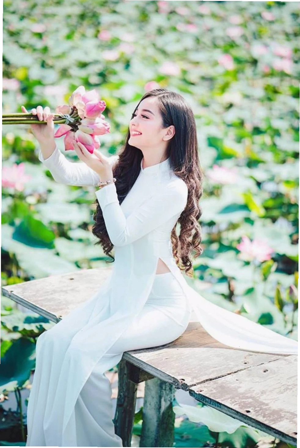 Áo dài cam sữa E ấp cùng áo dài màu cam sữa