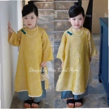 em gái mặc áo dài tinh khôi