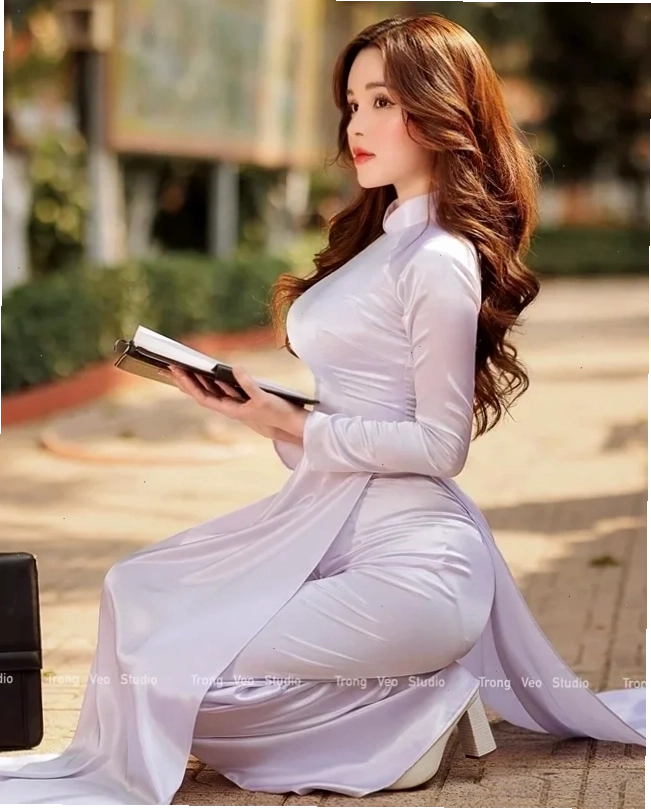 Áo dài hoa đào vàng Gái mặc áo dài sexy màu vàng in hoa đào