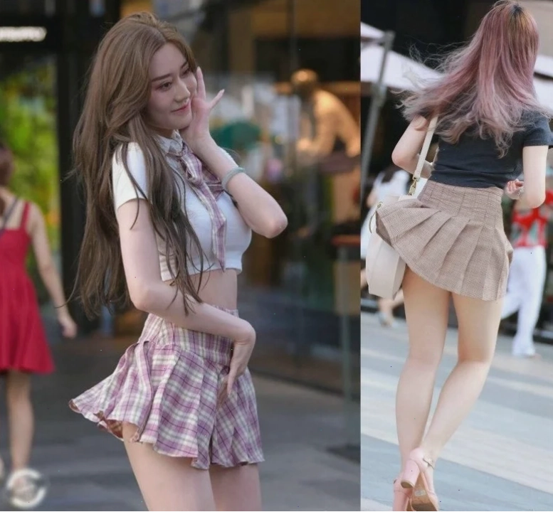 gái mặc váy lộ hàng ở sân vận động