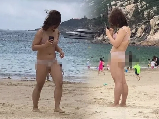 Gái tắm không mặc đồ nhặt vỏ ốc