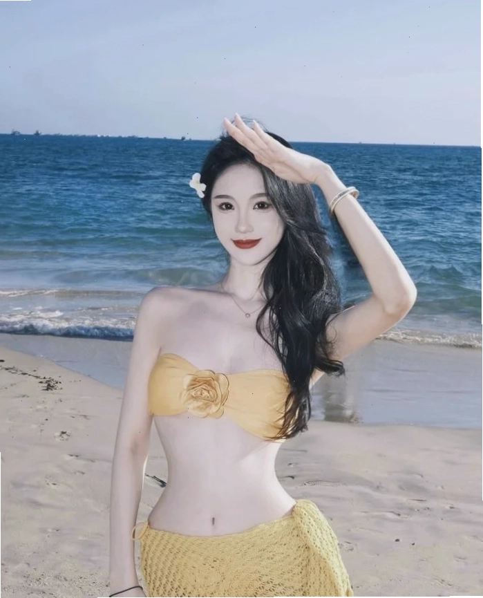 hình nền gái xinh mặc bikini tạo dáng bên vách đá